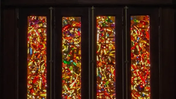 Sunlight through a stained glass church window, Ashes into Glass memorial jewellery at R.C. Smallbone Newbury